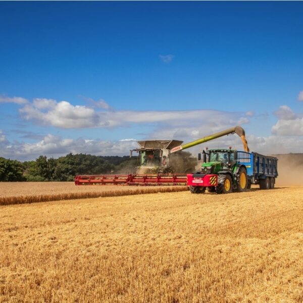 JSR Farms Claas combine & John Deere Tractor at harvest